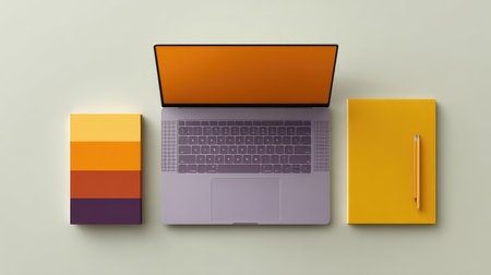 Creative agency layout with color palette, laptop, and sketchbook, clean background with empty spaceの素材