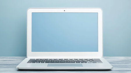 A modern laptop displaying stock market graphs, with ample space to add text about stock trading strategies or market updatesの素材