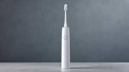 A modern electric toothbrush features soft bristles and a sleek design, ideal for personal care and oral hygiene routines. Perfect for product and lifestyle photography.の素材