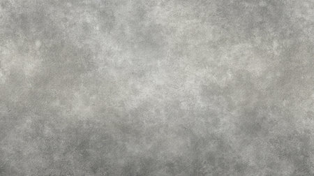 A soft gray abstract background featuring subtle textures, perfect for various design projects, including posters, digital media, and artistic expressions.の素材