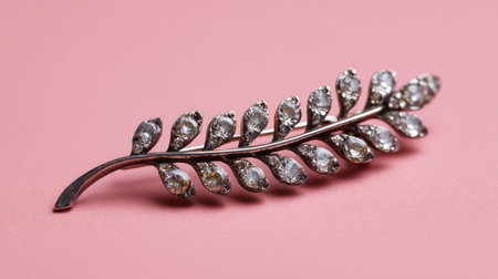 This exquisite silver leaf brooch features shimmering rhinestones, perfect for adding a touch of elegance to any outfit. Ideal for fashion enthusiasts and collectors.の素材