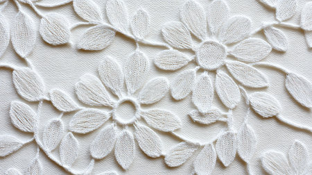 Explore the beauty of this intricate white floral embroidery pattern, showcasing delicate details perfect for textile design and fashion applications.の素材