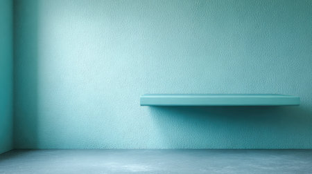A serene and minimalist interior featuring a flat shelf on a light blue wall and concrete floor, creating a perfect backdrop for modern design elements and decor.の素材