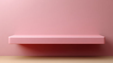 A minimalist pink shelf sits elegantly against a soft pink background, perfect for interior decoration. Ideal for creative staging and photography projects focusing on simplicity.の素材