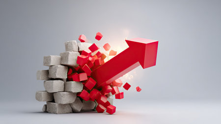 A striking red arrow bursts through a wall of concrete cubes, symbolizing growth and new opportunities, embodying the dynamic nature of business development and success.の素材