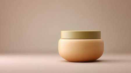 This image features a minimalistic beauty product container with a soft beige color. The simple and elegant design makes it suitable for skincare and cosmetic branding.の素材