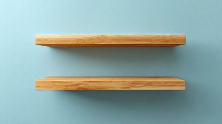 Elegant wooden shelves against a soothing light blue wall create a stylish backdrop for any interior space. Ideal for decor and organization, these shelves enhance aesthetics.の素材