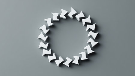 This image features an arrangement of abstract white geometric shapes in a circular form on a gray background, perfect for modern design projects and creative concepts.の素材