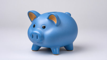 This playful blue piggy bank offers a delightful way for kids to learn about saving money and financial literacy while adding a charming touch to any child's room.の素材