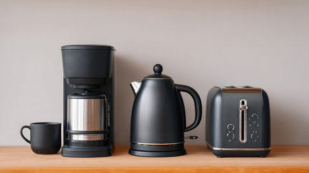 A collection of modern kitchen appliances in black is showcased on a wooden countertop, ideal for those who appreciate sleek design and functionality in their kitchen space.の素材
