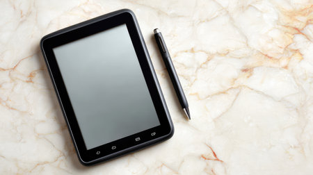 A modern tablet and stylus pen sit atop a stylish marble surface, ideal for showcasing technology, creativity, and productivity in contemporary environments.の素材