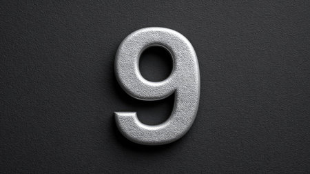 Metal number  on black velvet background, high contrast with minimalist layoutの素材