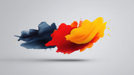 A captivating display of vibrant brush strokes in red, yellow, and blue sweeping across a soft gray background, representing modern artistry and creative expression in motion.の素材