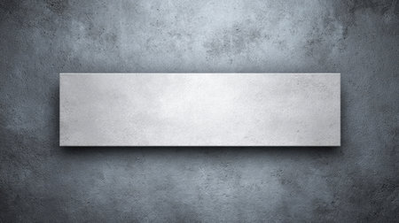 This gray concrete background features a smooth texture and a wide horizontal space ideal for adding text or graphic elements, suitable for various design applications.の素材