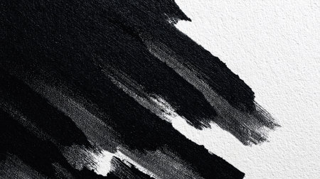 Abstract artwork featuring bold black brush strokes on a white canvas, creating a dynamic visual contrast ideal for artistic projects, backgrounds, and creative design elements.の素材