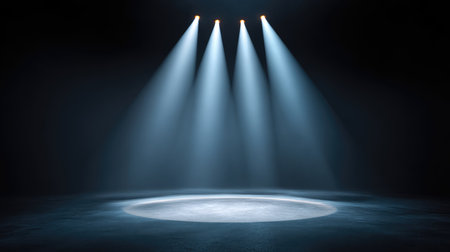 Bright spotlight beams shine through darkness, creating an intense atmosphere ideal for performances or events, emphasizing creativity and artistic expression in a captivating space.の素材