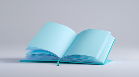 An open blue book against a minimalist background, perfect for creative projects, educational themes, and modern design concepts. Ideal for use in illustrations and promotional materials.の素材
