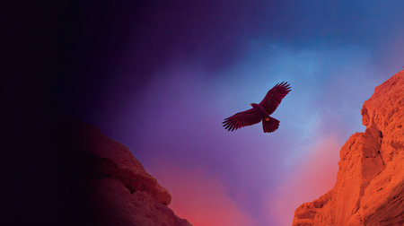 A stunning bird gracefully soars through a colorful sky over rugged mountain terrain during sunrise, creating a tranquil and inspiring atmosphere in natureの素材