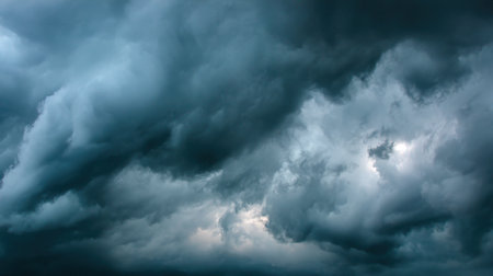 Captivating image of a dramatic sky filled with dark storm clouds creating an atmosphere of tension and mystery, showcasing nature's power and beauty.の素材