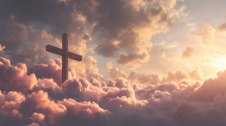 A serene scene featuring a wooden cross amidst soft pink clouds illuminated by golden sunlight, evoking feelings of peace, hope, and spirituality in a stunning sky.の素材