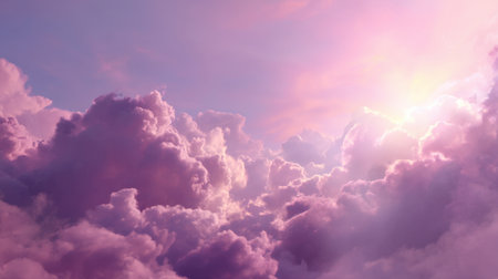 Beautiful pastel clouds illuminated by soft sunlight create a dreamy sunset scene in the sky, evoking tranquility and the beauty of nature's evening light.の素材
