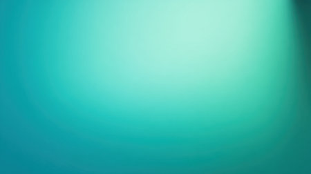 This abstract background features a gentle gradient of blue and green tones, perfect for creative projects or as a subtle backdrop in photography and design.の素材
