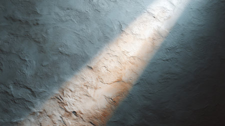 This abstract image features a striking lighting beam illuminating a textured wall surface, creating a dramatic and intriguing contrast for various creative applications.の素材