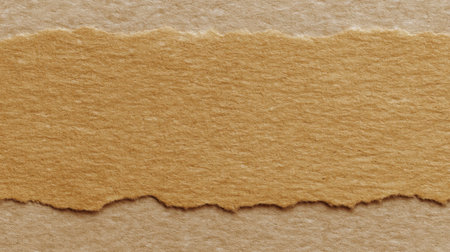 A close-up view of textured paper featuring a natural tear in warm beige tones. Ideal for artistic projects, design backgrounds, and crafting purposes.の素材