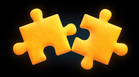Two vibrant yellow puzzle pieces show an engaging visual concept of connection and collaboration on a dark background, ideal for creative and educational projects.の素材