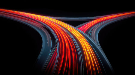 Captivating nighttime view of a highway overpass featuring striking car lights, highlighting motion and the intricate design of urban infrastructure under a dark sky.の素材