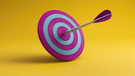 A vibrant dartboard with a sharp arrow in motion against a bright yellow background highlights themes of focus, strategy, and achievement in personal or professional goals.の素材