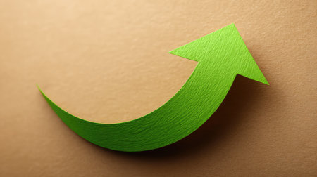 A bright green arrow positioned on a subtle brown background, symbolizing upward movement, growth, and positive progress suitable for various creative and business applications.の素材