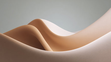 This image features gentle curves of smooth fabric, artistically arranged to evoke a sense of tranquility and minimalism in a soft color palette.の素材