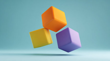 Vibrant building blocks floating against a soft blue background. Perfect for themes of education, play, and creativity, evoking a sense of fun and imagination.の素材