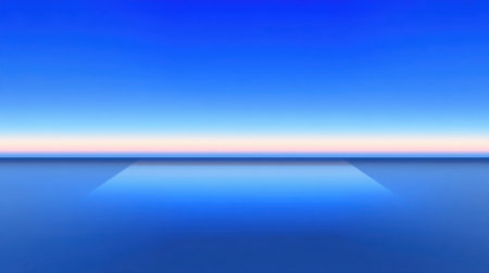 A captivating image of a serene horizon over calm water, featuring a vibrant blue sky with a gentle gradient of warm colors at dusk or dawn, perfect for backgrounds.の素材