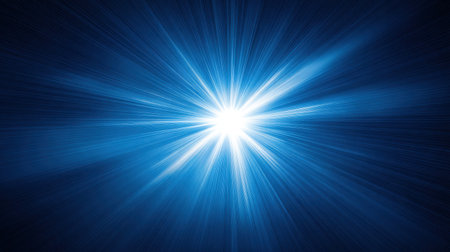 A stunning depiction of a bright blue burst of light radiating energy in an abstract design. This image creates a mesmerizing atmosphere, perfect for various projects.の素材