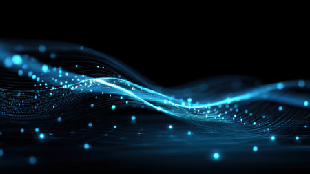 A mesmerizing abstract depiction of digital waves illuminated by glowing blue particles against a dark background, ideal for themes of technology and energy.の素材