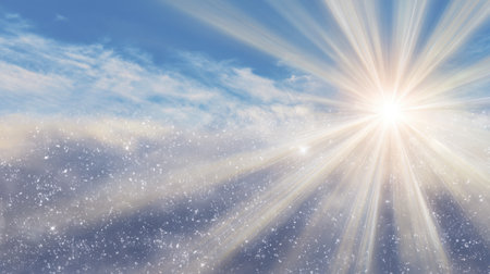 This image captures bright sun rays piercing through fluffy clouds in a clear blue sky. Gentle sparkles enhance the serene atmosphere, evoking peace and inspiration.の素材