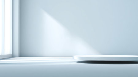 Bright minimalist interior featuring a round platform illuminated by soft natural light casting elegant shadows, ideal for creative design and photography projects.の素材