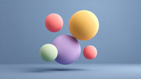 A striking arrangement of colorful 3D spheres set against a soft blue background, this abstract image is perfect for creative projects and modern design needs.の素材