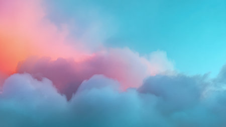 Vibrant pastel clouds fill the sky at dusk, showcasing a soothing blend of pink and blue hues that evoke a sense of calm and beauty in any project.の素材