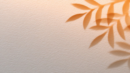 A serene composition featuring soft leaf shadows against a textured background, perfect for artistic projects, design inspirations, or nature-themed visuals.の素材