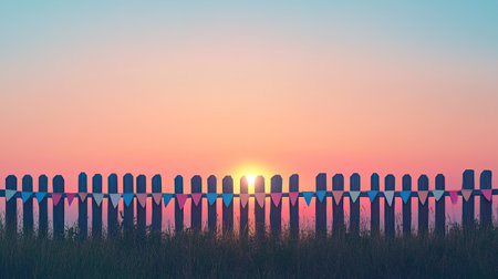A peaceful Easter sunrise over a countryside fence, decorated with simple, charming bunting.の素材