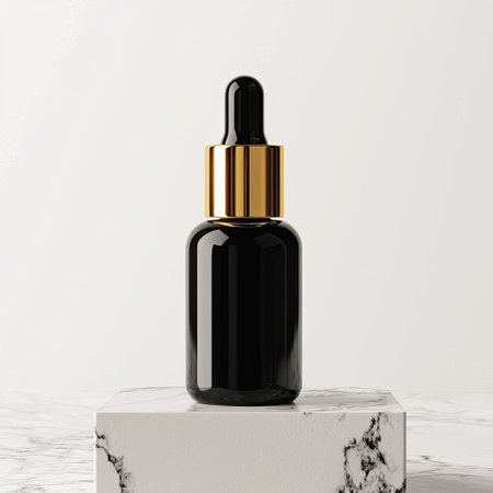 A beauty oil dropper bottle with golden serum inside, luxury skincare.の素材
