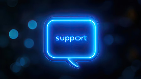 A neon blue chat support icon on a dark background, symbolizing real-time customer interactions.の素材