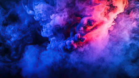 A burst of blue and red ink blending to form a deep purple color in a water tank.の素材