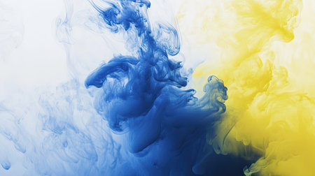 A gradient of liquid paint colors blending slowly from deep blue to light yellow.の素材