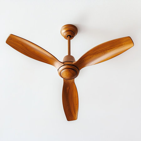 A ceiling fan with elegant wooden blades, captured on a white background for a minimalistic look.の素材
