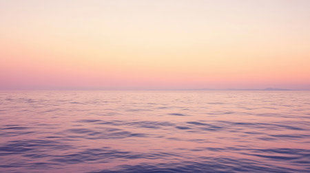 A smooth pastel gradient of soft peach, light pink, and subtle lavender, offering a peaceful and serene background for creativity.の素材