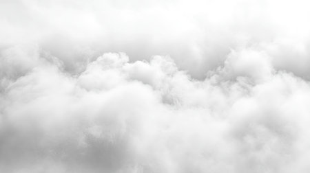 A soft, overcast sky with light gray clouds, creating a muted, peaceful background ideal for minimalist designs.の素材